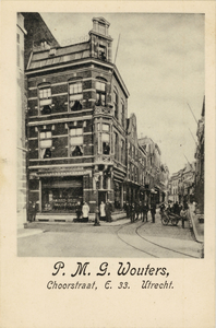 711658 Reclameprentbriefkaart van P.M.G. Wouters, Goud- en Zilversmid, Choorstraat E. 33, met een foto van het ...